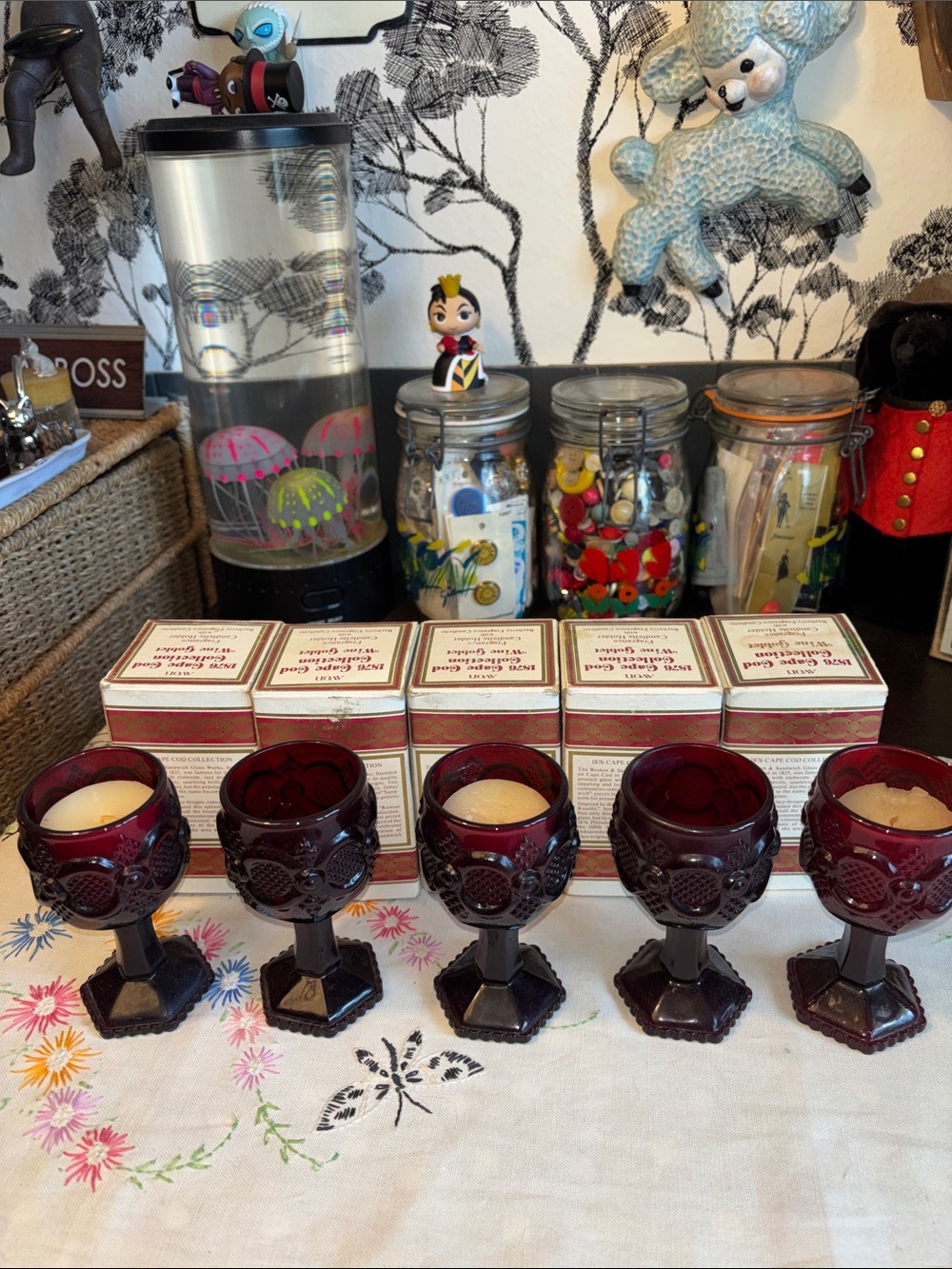 NIB And EUC AVON 1876 Cape Cod Collection Ruby Red Wine Goblets shown with their